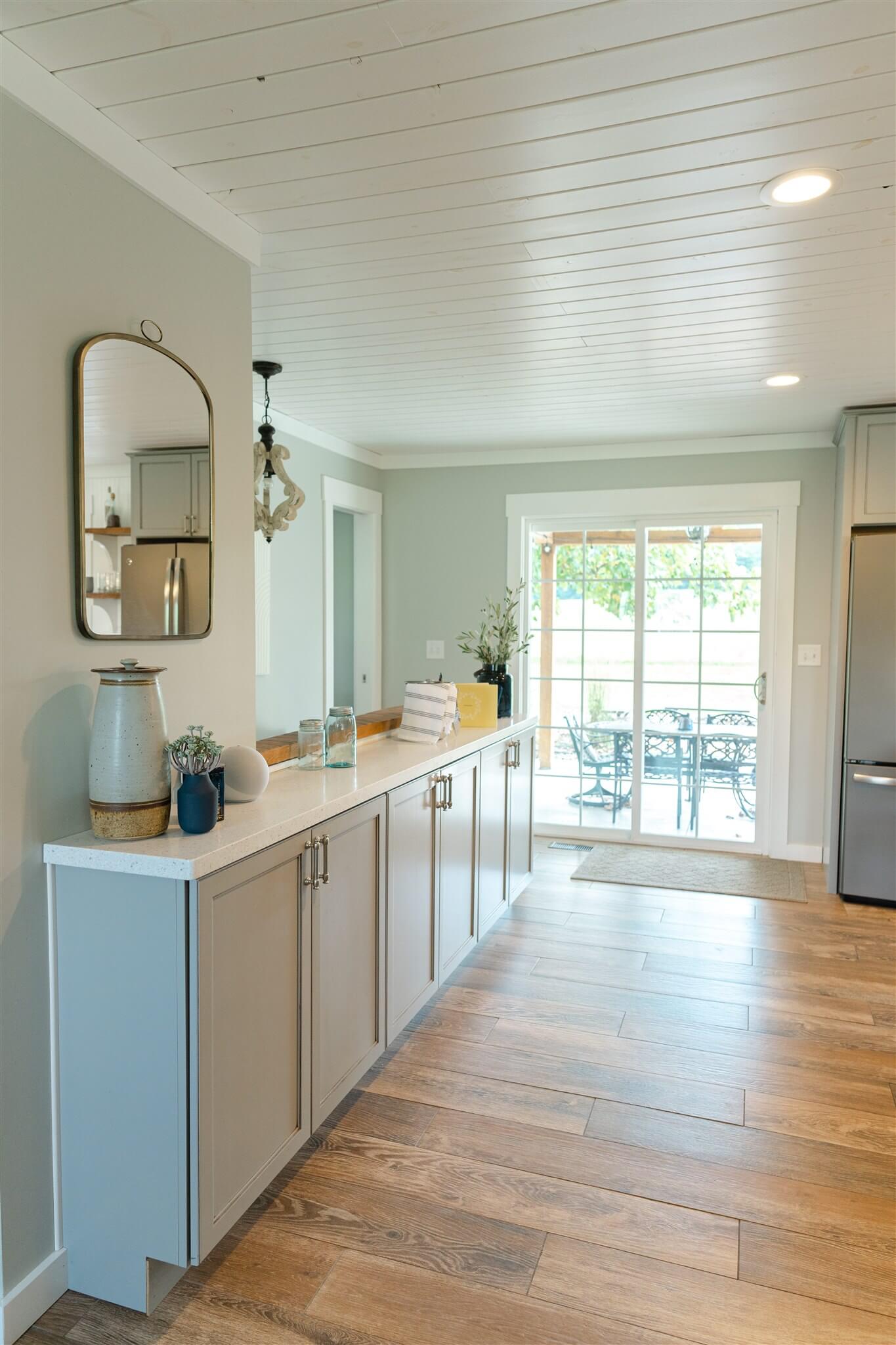 Hallway buffet counter leading to patio doors